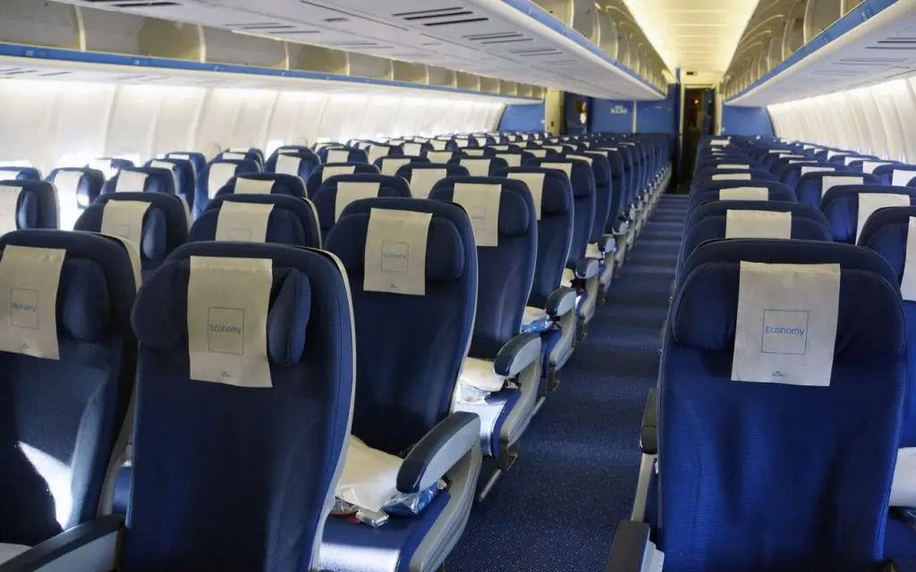 Economy class on the plane: seats, service. Plane ticket: transcript